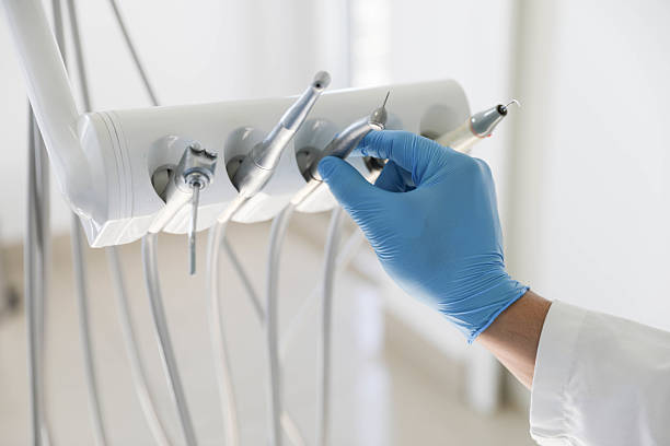 Professional Dental Implants technician working in Rogers, AR
